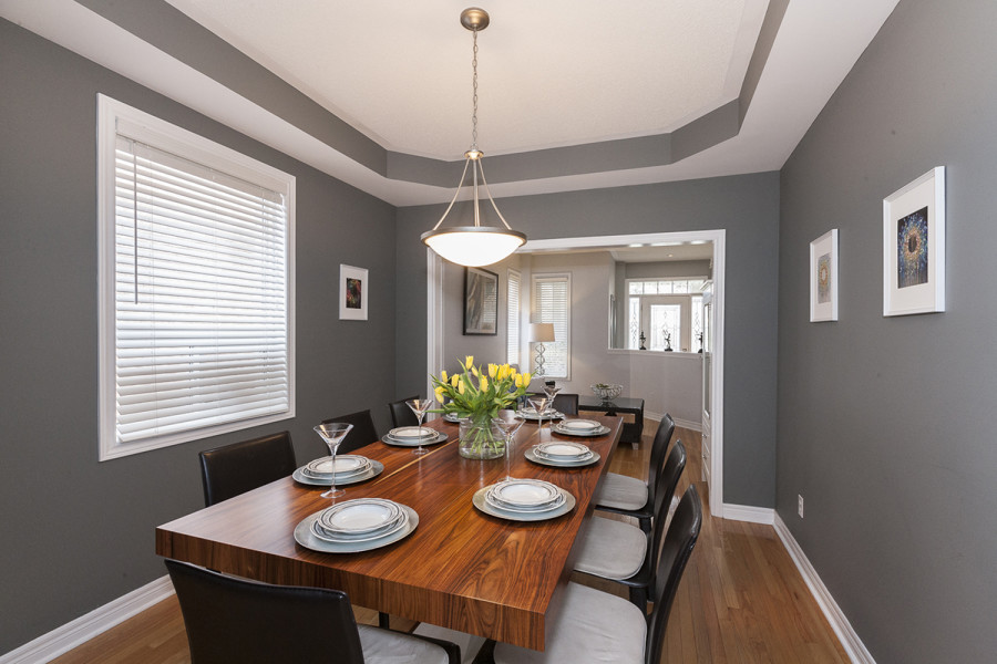 Spacious Dining room with large wooden dining table